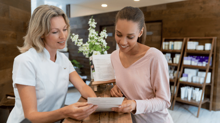 massage therapist with client