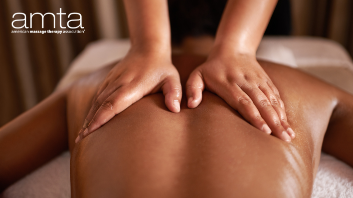 An image of an upper-back massage with the AMTA logo in the corner.