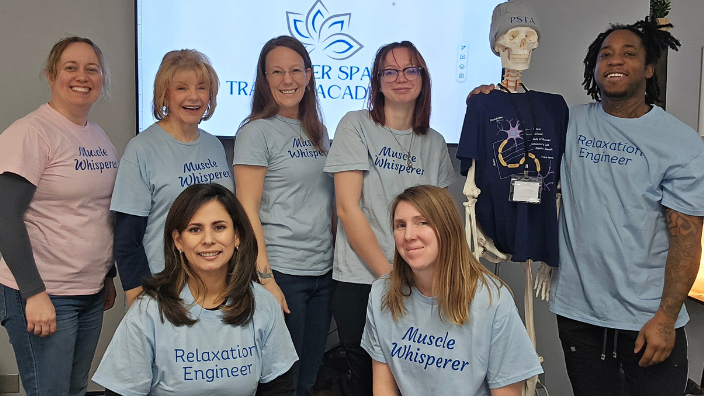 an image of a group of people smiling.