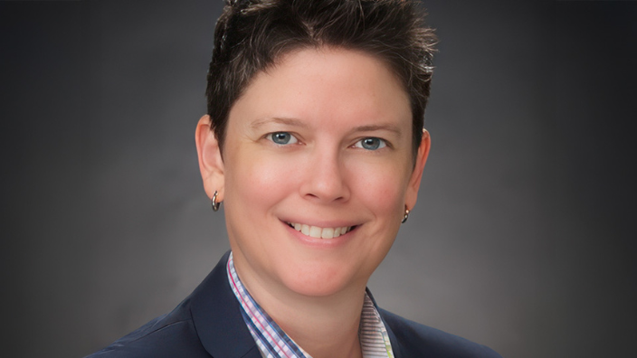 Headshot of a woman, Teri Mayo, Executive Director of Massage Therapy Foundation, smiling.